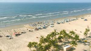 Apartamento Pé na Areia Frente ao Mar - Vista Mar Incrível - Estacionamento & Wi-Fi