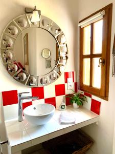 Appartements le 1835, studio rouge-Corail : photos des chambres