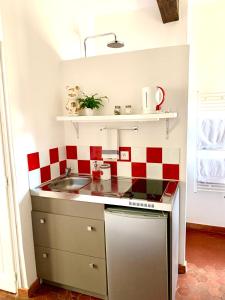 le 1835, studio rouge-Corail