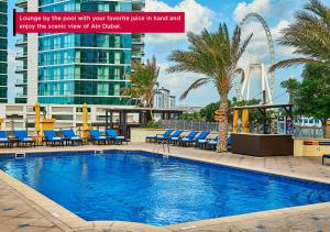 Swimming pool, Ramada Hotel & Suites By Wyndham Dubai JBR in Dubai