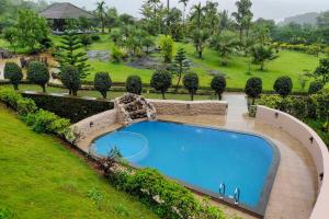 StayVistas Bali Villa at Vyoman - 4BHK with Sports Turf & Private Pool