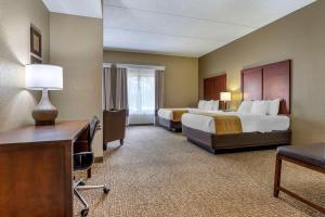 Queen Suite with Two Queen Beds and Sofa Bed room in Comfort Inn & Suites Mocksville I-40