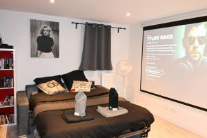 Appartements class&cinema Appt 10mn Aeroport Roissy CDG : photos des chambres