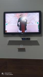 Pousada Quarto com frigobar,ar e garagem gratuita