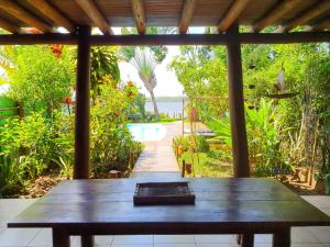 Casa de Temporada 4 Coqueiros, Piscina, 16 Hóspedes, 4 Suítes e Churrasqueira em Itacaré na Bahia