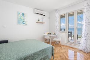 Studio apartman Rozi