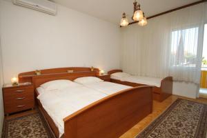 Triple Room with Balcony room in Rooms with a parking space Makarska - 6778