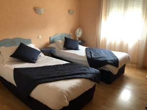 Hotels Hotel Le Roi Gourmand : Chambre Lits Jumeaux