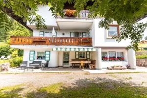 Sa Mont Home - Moderno appartamento con parcheggio, sauna e deposito sci