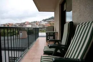 Piso Céntrico con Terraza y Garaje Para Tu Familia - Mougás