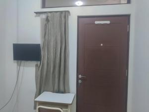 Colombus Residence Karawang Mitra RedDoorz