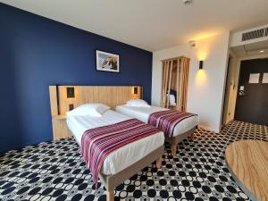 Hotels Akena Nantes Reze Aeroport : photos des chambres