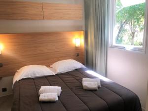 Complexes hoteliers Camping La Pinede : photos des chambres