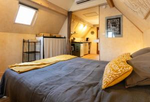 Appartements Gites Un Jardin dans la Falaise : photos des chambres