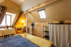 Appartements Gites Un Jardin dans la Falaise : photos des chambres