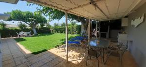 Petrakis Afrathias garden house