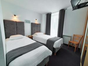 Hotels Hotel Les Tilleuls de Pareloup a Salles-Curan : photos des chambres