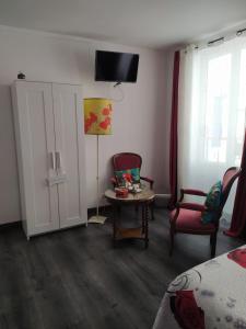 Hotels Les Coquelicots : photos des chambres