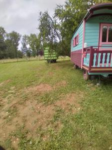 Tentes de luxe Roulotte verte : photos des chambres