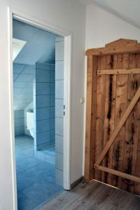 W Ziołowym Ogrodzie - pokoje z dostępną kuchnią, apartament