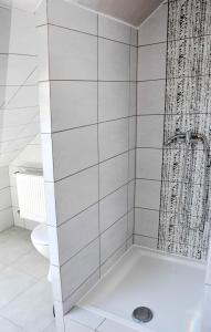 W Ziołowym Ogrodzie - pokoje z dostępną kuchnią, apartament