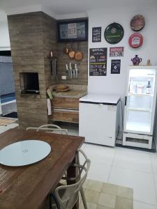 Casa com piscina e churrasqueira em Massaguaçu SP