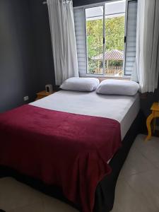 Casa com piscina e churrasqueira em Massaguaçu SP