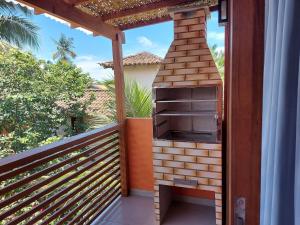 Cotia - Novo Flat com Piscina, 50mts da praia, churrasqueira privativa, ar con, wi-fi, netflix, garagem