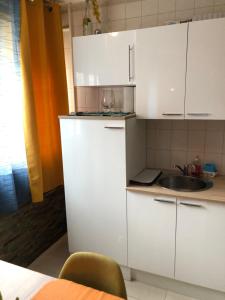 Appartements T3 Centre Ville Neuve : photos des chambres