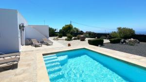 Villa Essence - a unique detached villa with A-C, heated private pool, hottub, gardens, patios and stunning views!