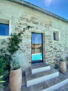 B&B / Chambres d'hotes La Maison des Vendangeurs - TABLE D'HOTES le soir du jeudi au lundi - Jacuzzi - Balneo SPA - ACCES PISCINE pour toutes les chambres sauf STUDIO COQUET- Piscine de mai a mi-octobre : photos des chambres