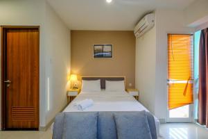 Modern and Spacious Studio with City View @ Grand Kamala Lagoon Apartment By Travelio - 4hvězdičkové hotely ve městě Pekayon Satu