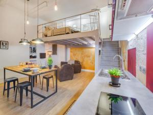 Appartements Rare Loft vue sur les toits - Suites Gaya Centre Historique : photos des chambres