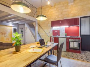 Appartements Rare Loft vue sur les toits - Suites Gaya Centre Historique : photos des chambres