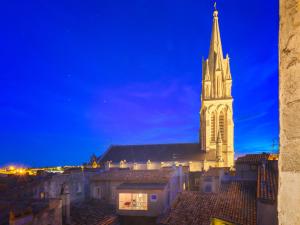 Appartements Rare Loft vue sur les toits - Suites Gaya Centre Historique : photos des chambres