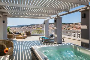 Master Suite with Outdoor Hot Tub and Panoramic Sea View room in Aenos Hotel