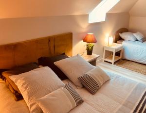 B&B / Chambres d'hotes Les Pieds dans l'Herbe : photos des chambres