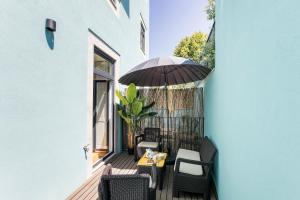 Central Studio with Pool & Patio by LovelyStay