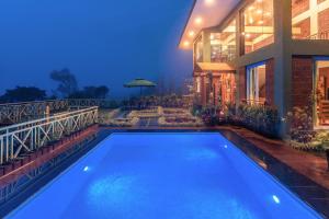 Status Villa by StayVista - Valleys view, Traditional-modern blend interiors, Private plunge pool & Gazebo