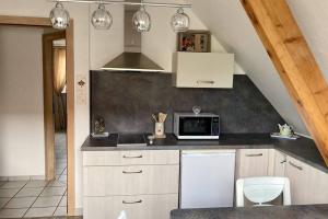 Appartements Le papillon,Logement cosy en Alsace : photos des chambres