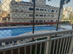 GUARUJÁ ASTURIAS, LAZER COMPLETO, AR CONDICIONADO E VARANDA GOURMET