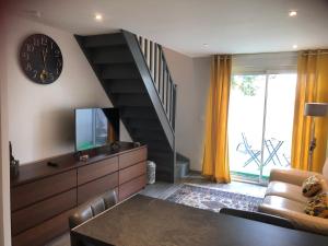 Appartements Le defi : photos des chambres