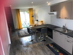 Appartements Le defi : photos des chambres