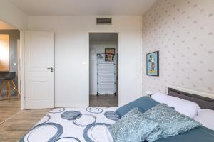 Appartements LYS - 7 Min des parcs Walt Disney- Parfait pour les familles- Arrivee Autonome - Parking & Wifi Gratuit : photos des chambres