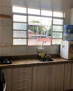 Quarto Privado em residência no Coração de Foz - casa e banheiro compartilhado