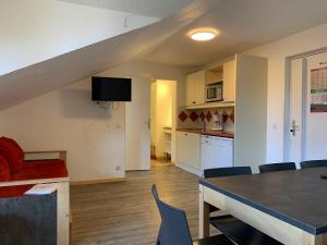 Appartements travelski home classic - Residence La Muzelle : photos des chambres