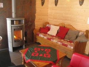 Chalets Magnificent wooden chalet with sauna : photos des chambres