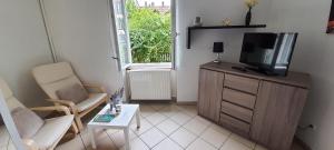 Appartements Appartement avec jardin a Colmar : photos des chambres