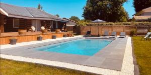 Chalets CHALET MONTANA - AU COTTAGE DU MEDOC - Proche de BORDEAUX : photos des chambres