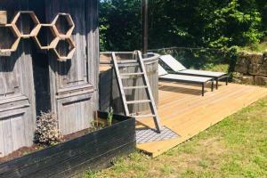 Maisons de vacances La cabane des vignes avec spa nordique : photos des chambres